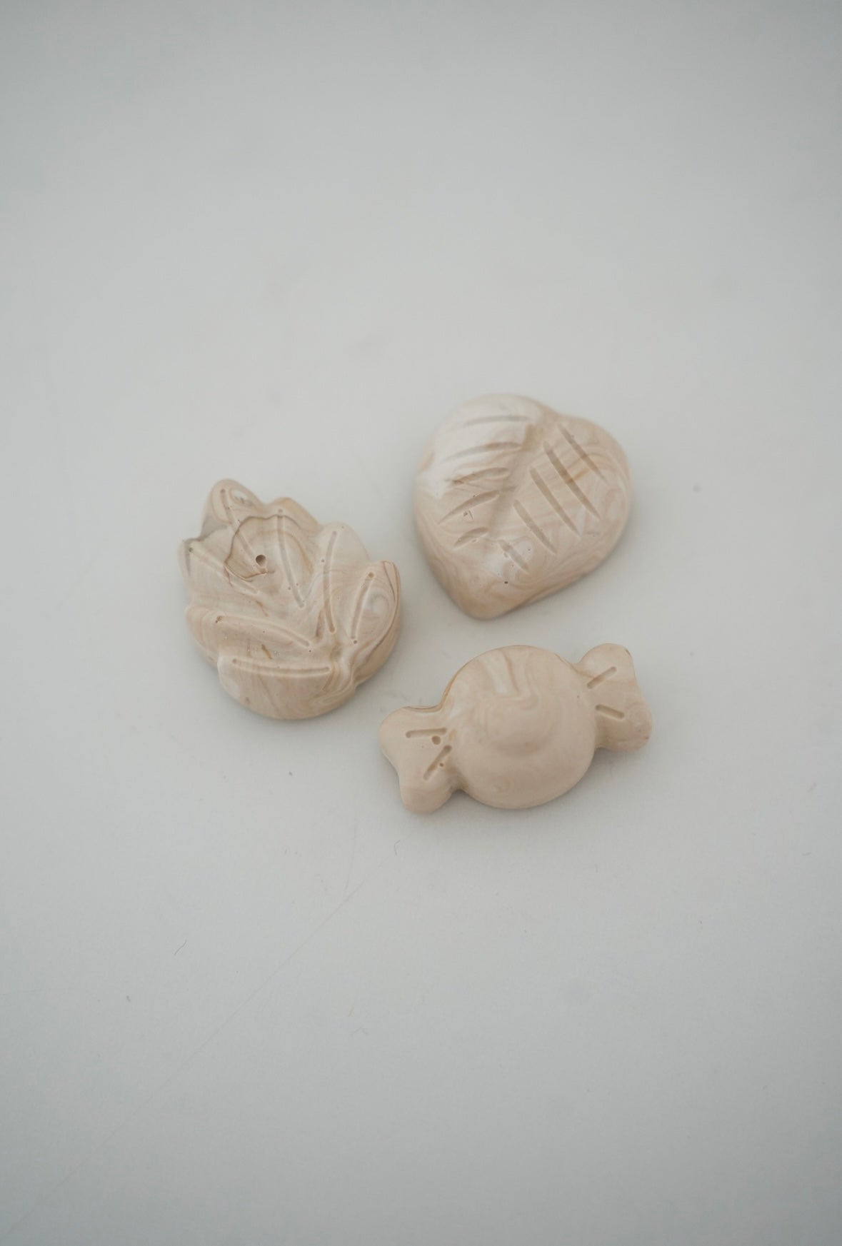 Magnets marbrés beiges