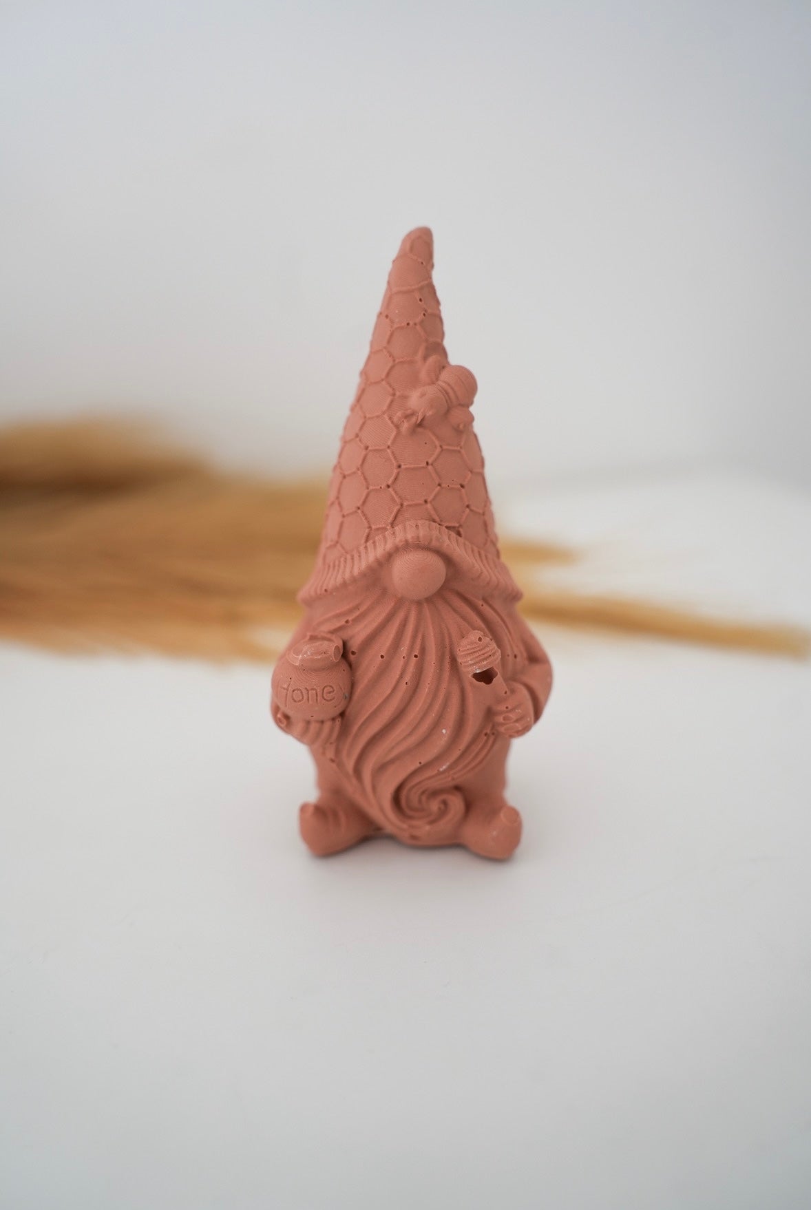 Gnome avec son pot de miel