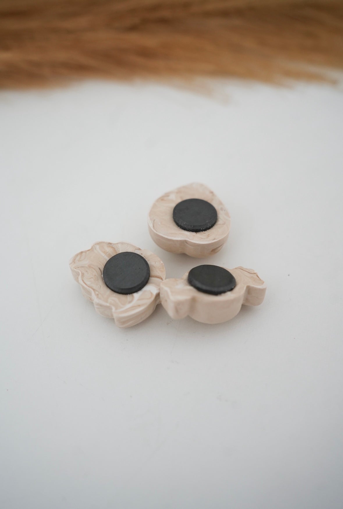 Magnets marbrés beiges